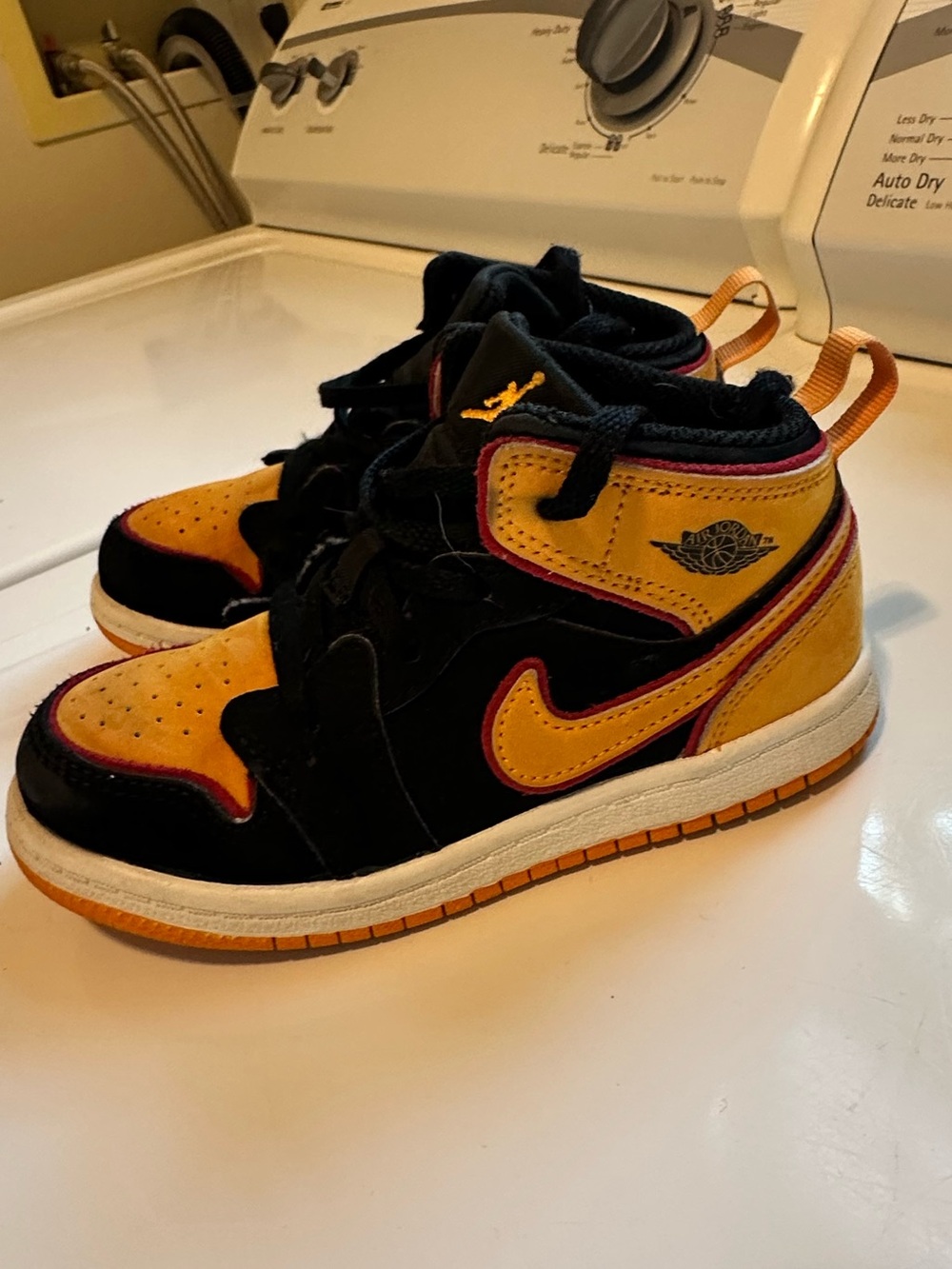 Nike Air Jordan 1 Mid-Top Basketball Shoes in Black and Yellow Vivid Orange 10